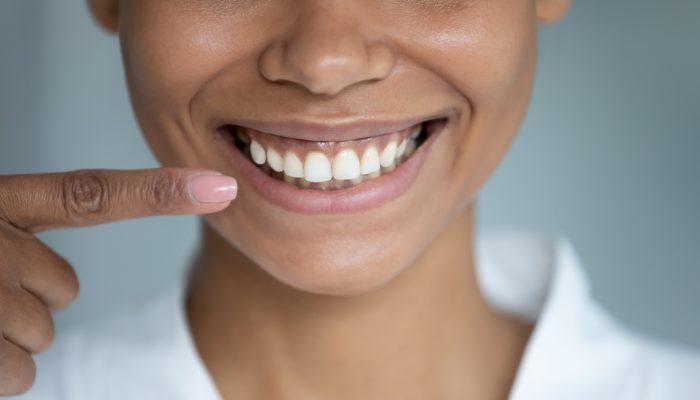 Close,Up,African,Woman,Point,Finger,At,Perfect,Straight,Hollywood